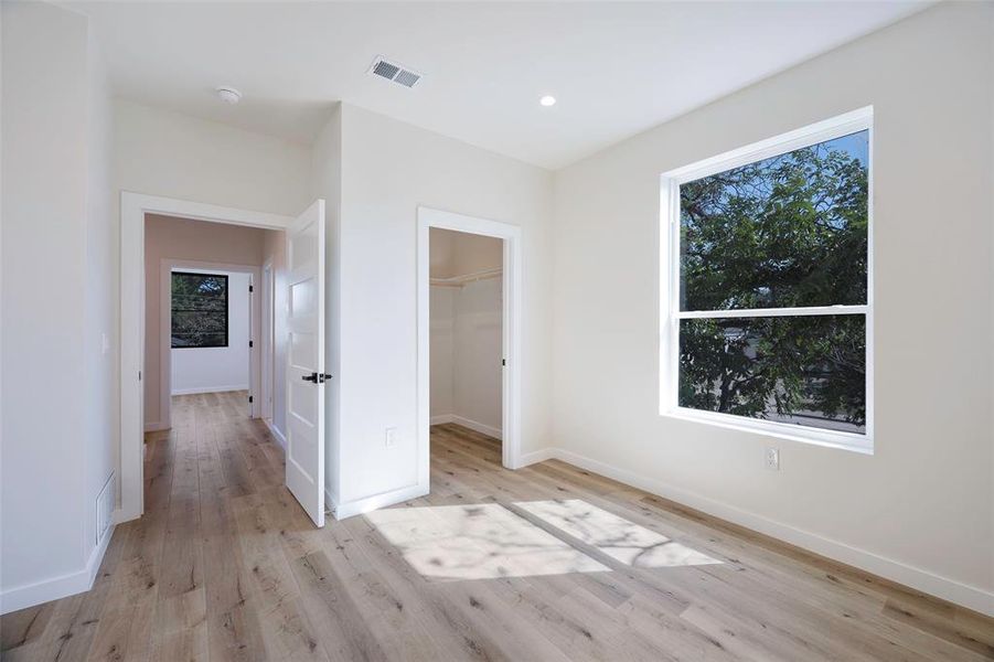 Bedroom with walk in closets