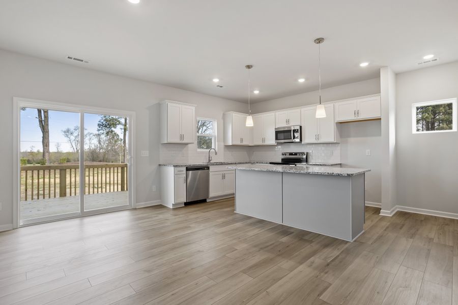Furnished interior view inside a new home in Cambridge Reserve, Angier (Image 7). Furnished interior view inside a new home in Cambridge Reserve, Angier (Image 7).