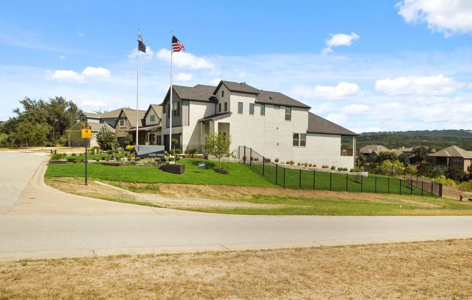 Front exterior of a new home in Lakeside at Tessera, Lago Vista, TX, highlighting curb appeal (Image 20). Front exterior of a new home in Lakeside at Tessera, Lago Vista, TX, highlighting curb appeal (Image 20).