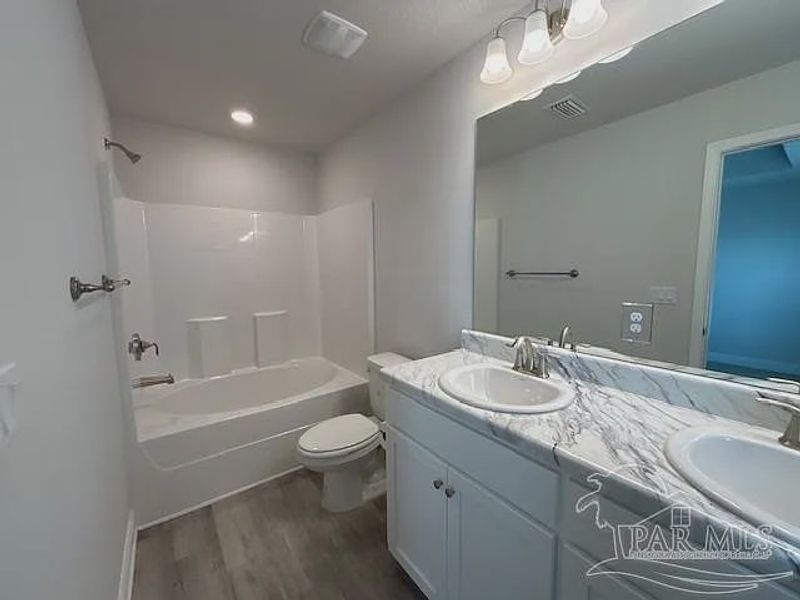 Furnished interior view inside a new home in Turtle Creek, Cantonment (Image 5).