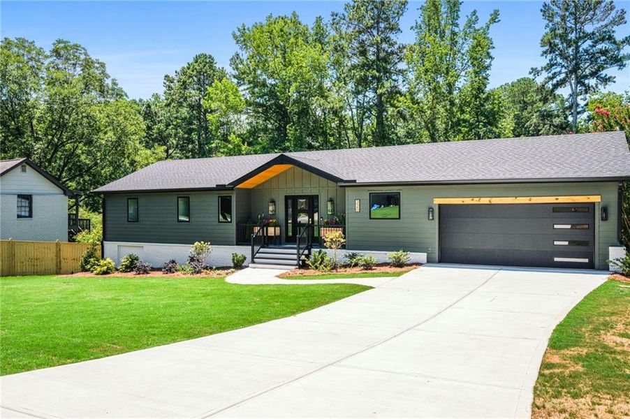Front exterior of a new home in , Alpharetta, GA, highlighting curb appeal (Image 23).