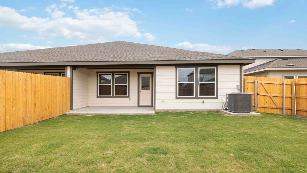 Exterior details and patio area of a home in Palomino, Manor (Image 4).