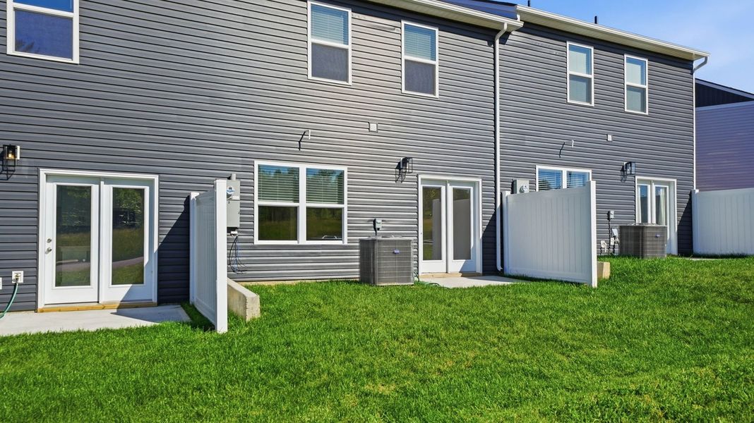 Exterior details and patio area of a home in The Arbor Townhomes, Kingsport (Image 18). Exterior details and patio area of a home in The Arbor Townhomes, Kingsport (Image 18).
