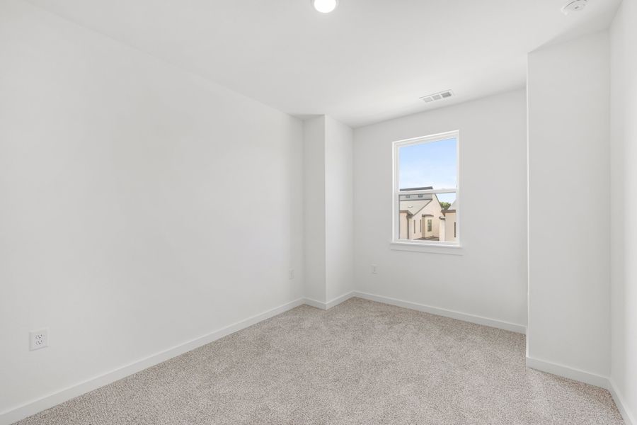 Spacious, unfurnished interior of a new home in Willow Grove Townhomes, Melissa (Image 24).