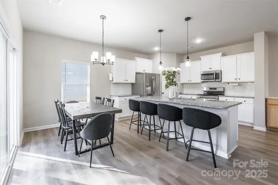 Furnished interior view inside a new home in McGee Place, Charlotte (Image 8).