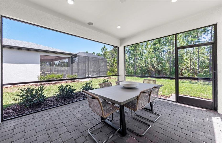 Exterior details and patio area of a home in The Strand at Cedar Grove, North Port (Image 21).