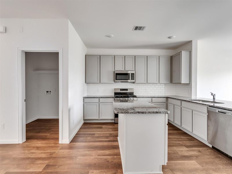 Furnished interior view inside a new home in Sweetgrass Village, Barrett (Image 5).