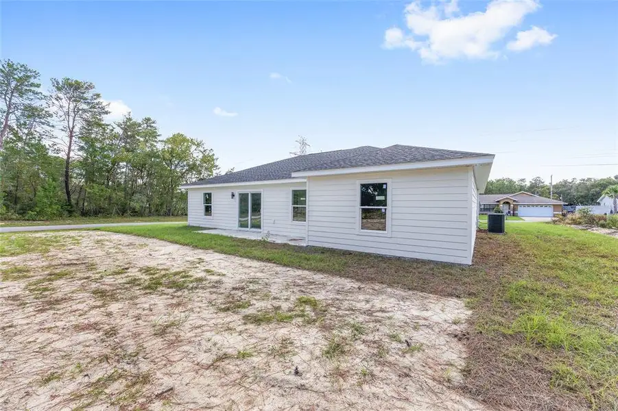 Exterior details and patio area of a home in , Ocala (Image 26).