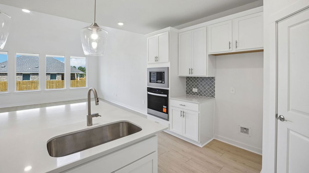 Furnished interior view inside a new home in Rosenbusch Ranch, Leander (Image 9).