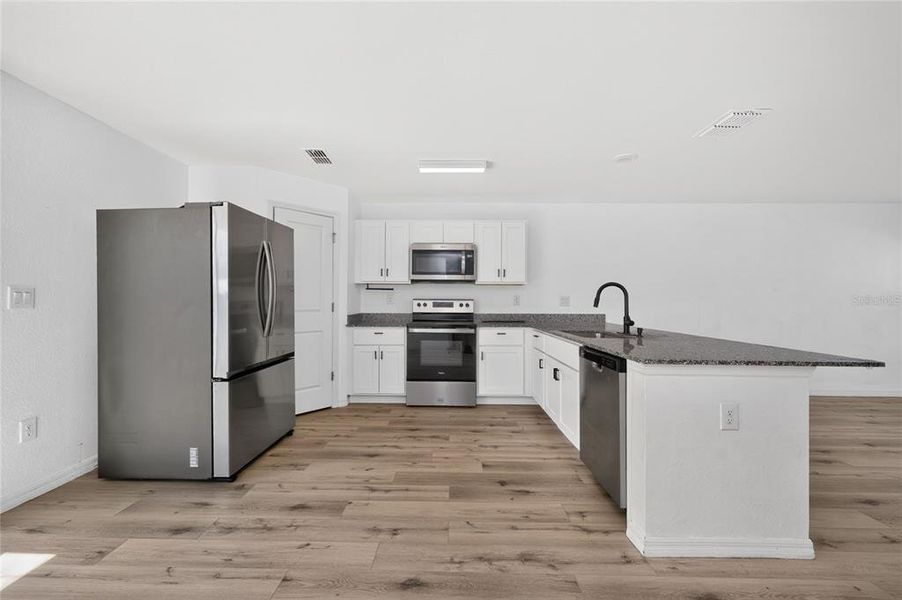 Furnished interior view inside a new home in , Port Charlotte (Image 9).