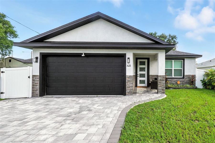 Front exterior of a new home in , Orlando, FL, highlighting curb appeal (Image 19).