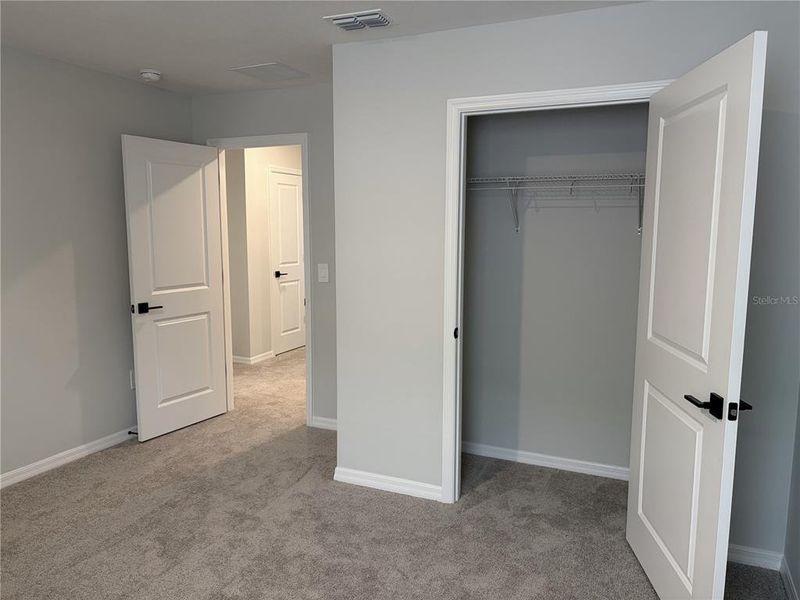 Spacious, unfurnished interior of a new home in Oakfield Trails, Parrish (Image 19).