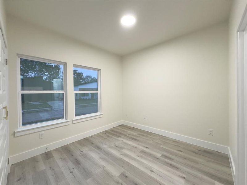 Spare room with light hardwood / wood-style floors