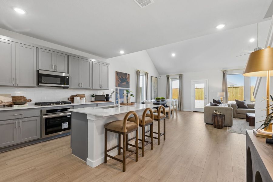 Kitchen in a Sunset Ranch Winters Model Home in Gunter TX by Trophy Signature Homes