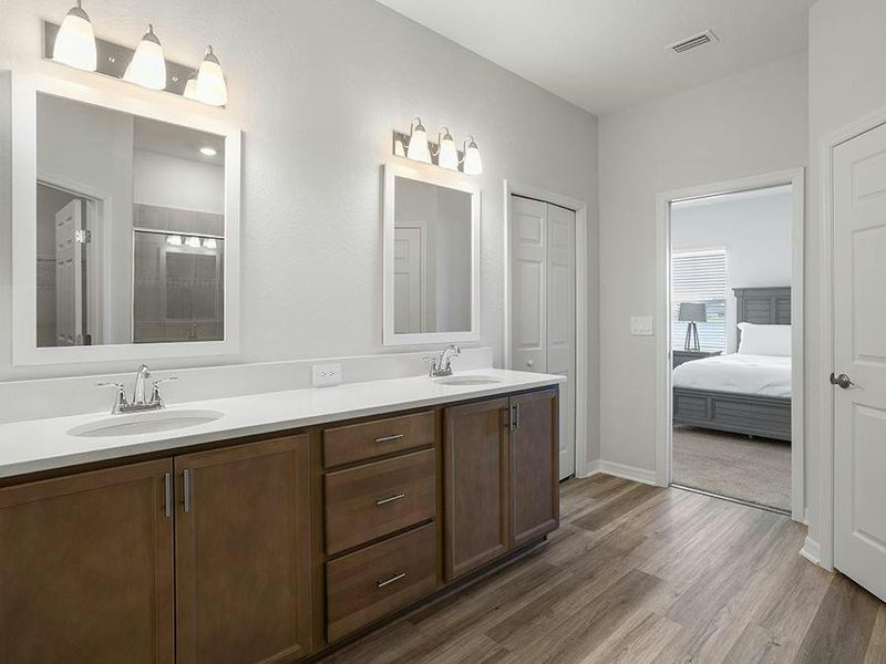 Your suite includes an en-suite bath with a large tiled shower - Aubrey II by Highland Homes Your suite includes an en-suite bath with a large tiled shower - Aubrey II by Highland Homes