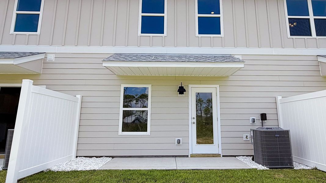 Exterior details and patio area of a home in WindMark Beach, Port Saint Joe (Image 4).