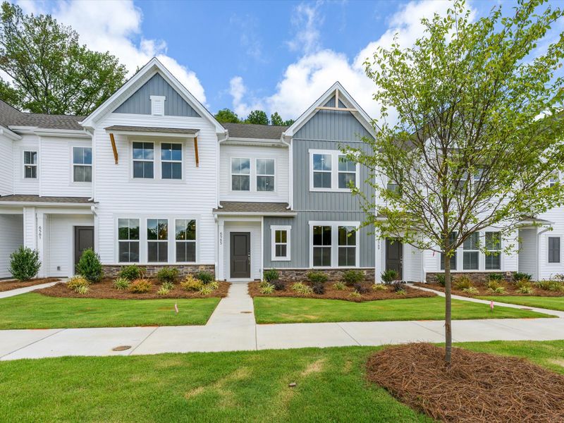 Front exterior of a new home in Westwood Reserve, Charlotte, NC, highlighting curb appeal (Image 2). Front exterior of a new home in Westwood Reserve, Charlotte, NC, highlighting curb appeal (Image 2).