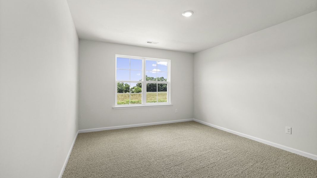 Spacious, unfurnished interior of a new home in The Landing at Summerhaven, Mebane (Image 22).