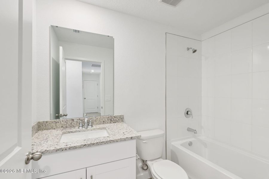 Furnished interior view inside a new home in Flagler Village - Classic Series, Palm Coast (Image 11).