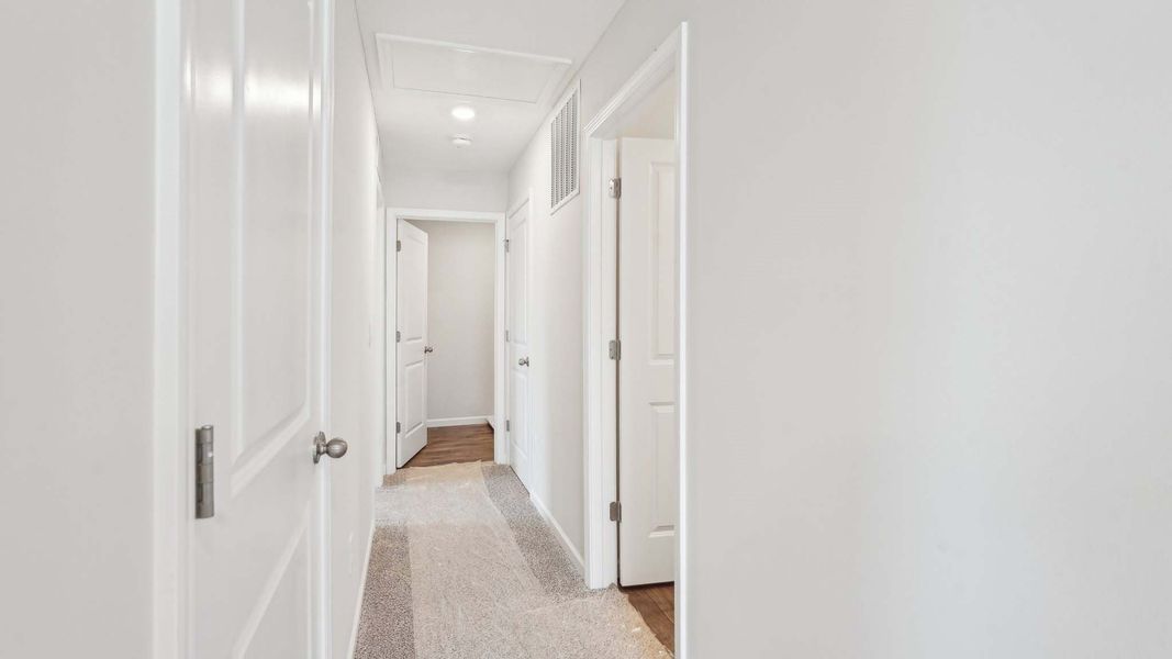 Spacious, unfurnished interior of a new home in The Pines at Blake Farm, Wilmington (Image 19). Spacious, unfurnished interior of a new home in The Pines at Blake Farm, Wilmington (Image 19).