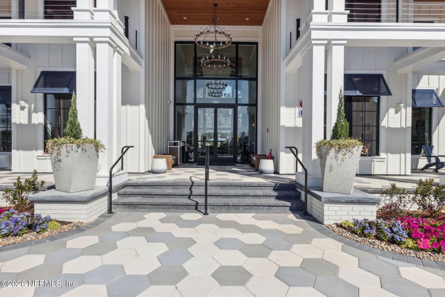 Exterior details and patio area of a home in Del Webb Wildlight, Wildlight (Image 22).