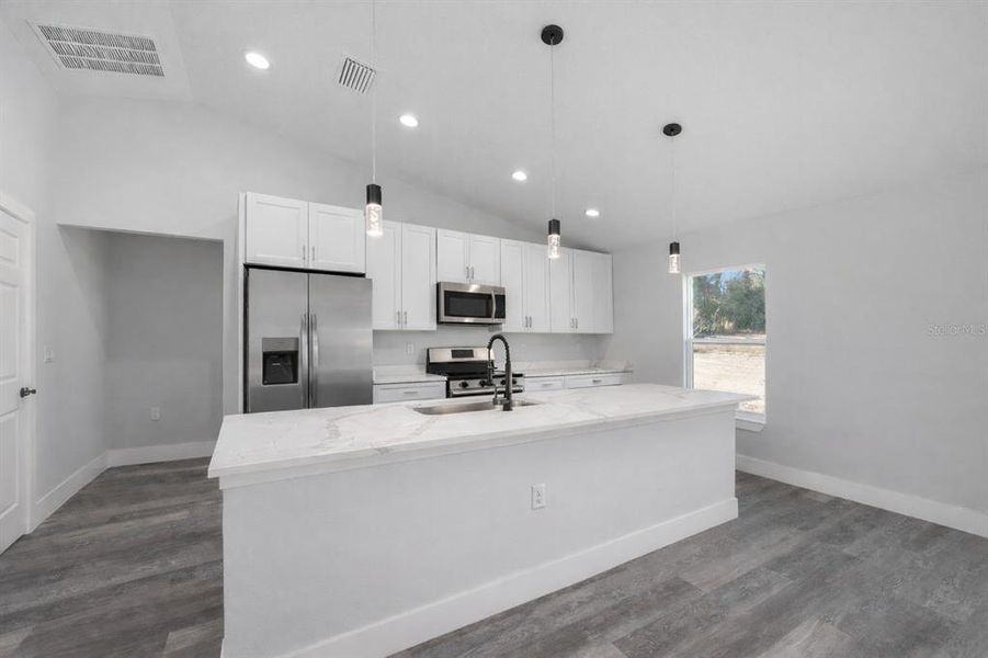 Furnished interior view inside a new home in , Dunnellon (Image 5).