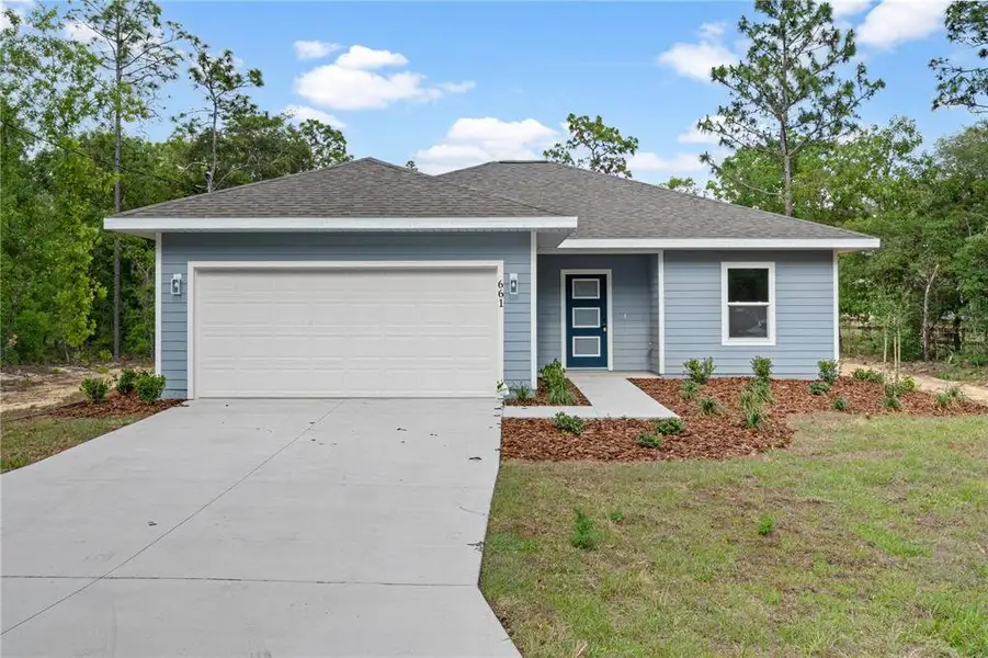 Front exterior of a new home in , Williston, FL, highlighting curb appeal (Image 2). Front exterior of a new home in , Williston, FL, highlighting curb appeal (Image 2).