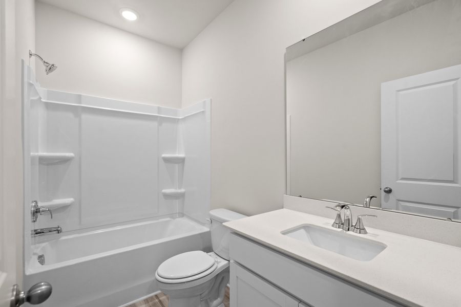 Furnished interior view inside a new home in Cypress Ridge - The Coastline Series, Longs (Image 14).