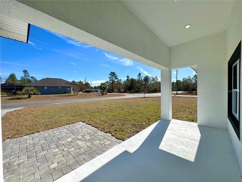 Exterior details and patio area of a home in , Citrus Springs (Image 20).