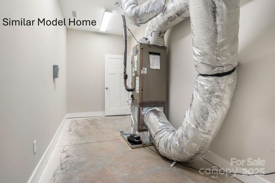 Lower level furnace room with additional storage Lower level furnace room with additional storage