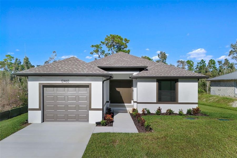 Front exterior of a new home in , Punta Gorda, FL, highlighting curb appeal (Image 1). Front exterior of a new home in , Punta Gorda, FL, highlighting curb appeal (Image 1).