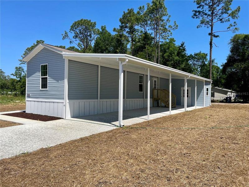 Exterior details and patio area of a home in , Ocala (Image 16).