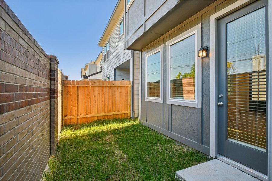 Exterior details and patio area of a home in Spring Brook Village - City Series, Houston (Image 26).