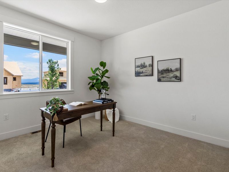 Representative furnished interior of a home built from the Reese by Lokal Homes in Jackson Creek, Monument (Image 16).