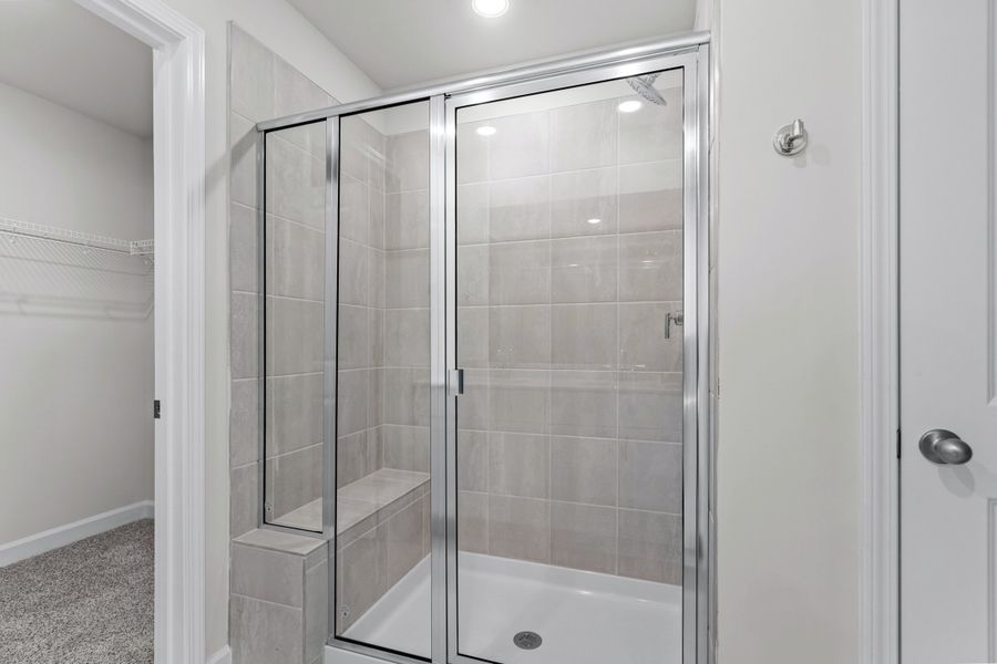 The primary ensuite boasts duel sinks, tile shower and large walk-in closet. The primary ensuite boasts duel sinks, tile shower and large walk-in closet.
