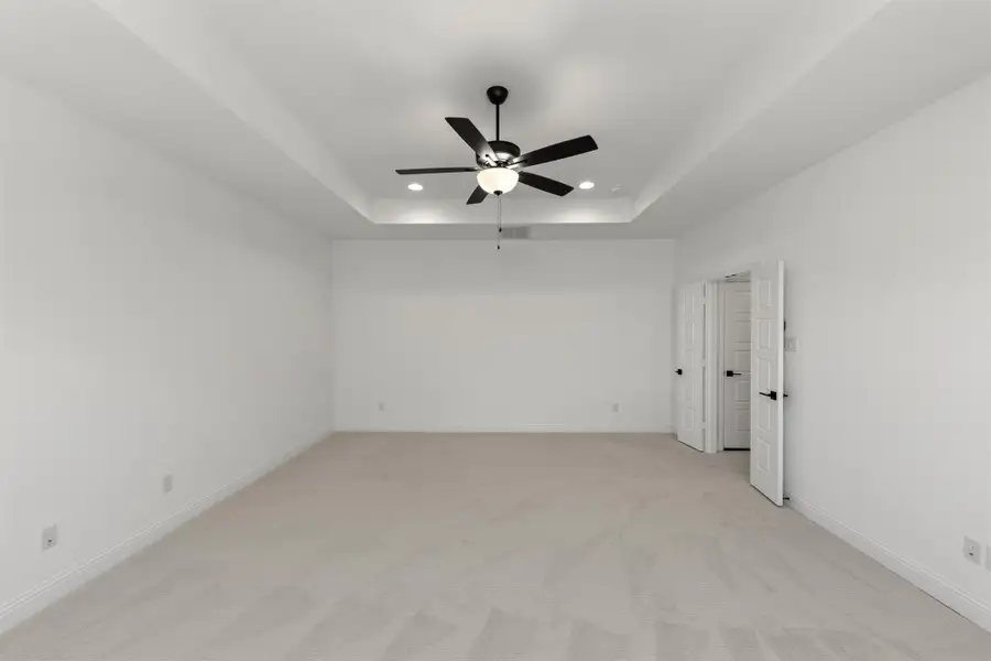Representative unfurnished interior of a home built from the Newport by Windsor Homes in Nelson Lake Estates, Rockwall (Image 24).