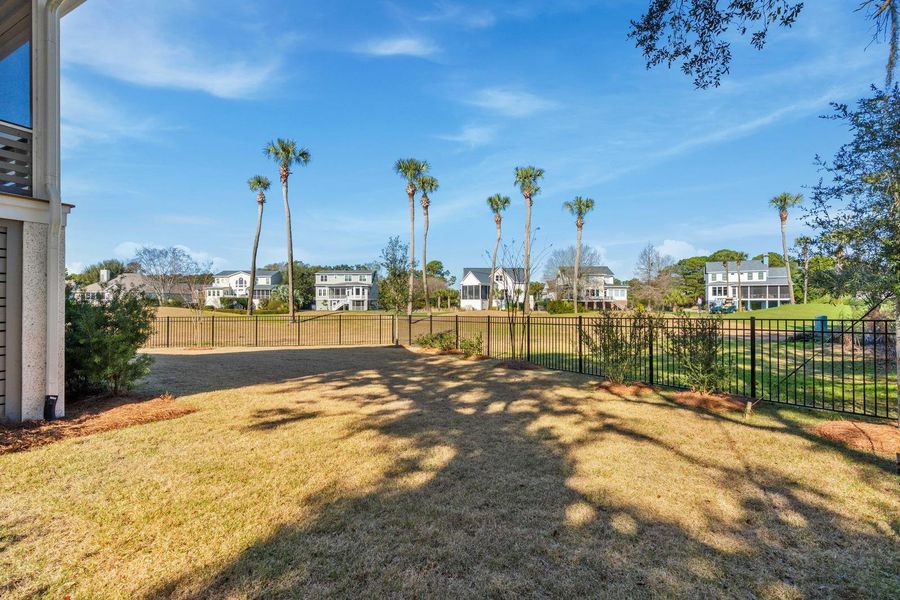 Exterior details and patio area of a home in , Johns Island (Image 33).