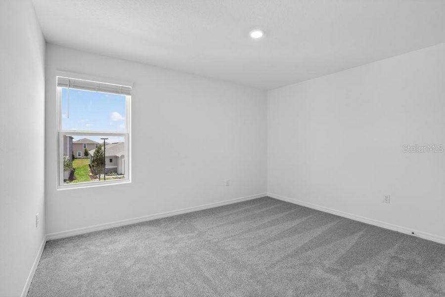 Spacious, unfurnished interior of a new home in Waterstone, Groveland (Image 40).