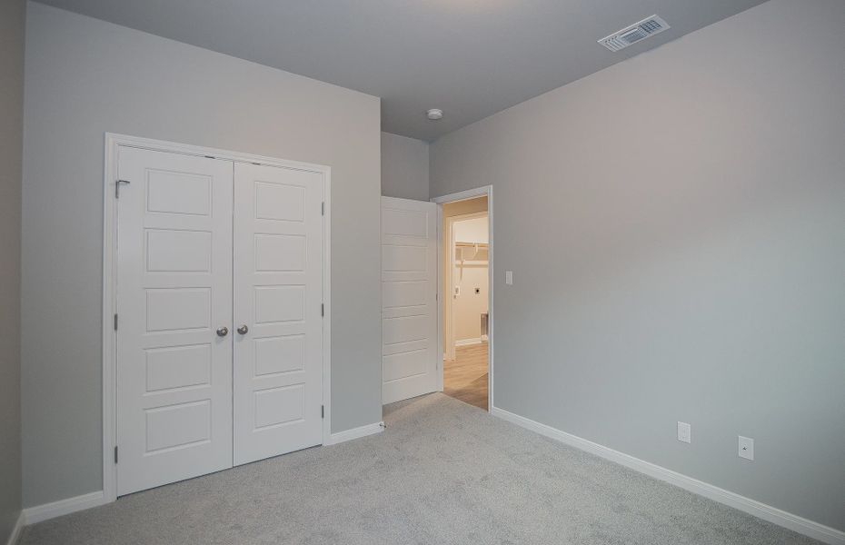 Representative unfurnished interior of a home built from the Kingsland by Steve Klein Custom Builder in TerraVista, Victoria (Image 13).