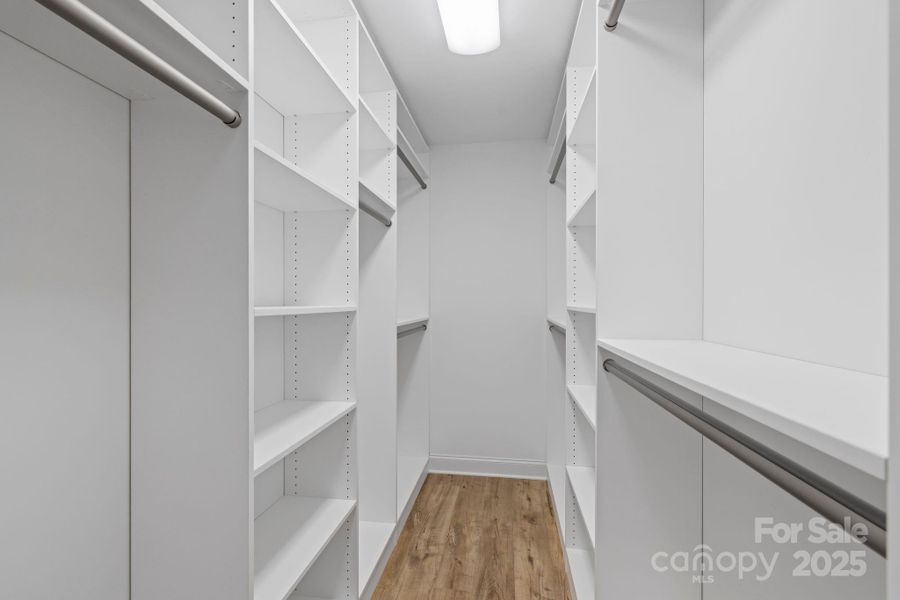 Primary suite features a fully custom closet with built-in shelving and hanging space—no wire shelving. Primary suite features a fully custom closet with built-in shelving and hanging space—no wire shelving.