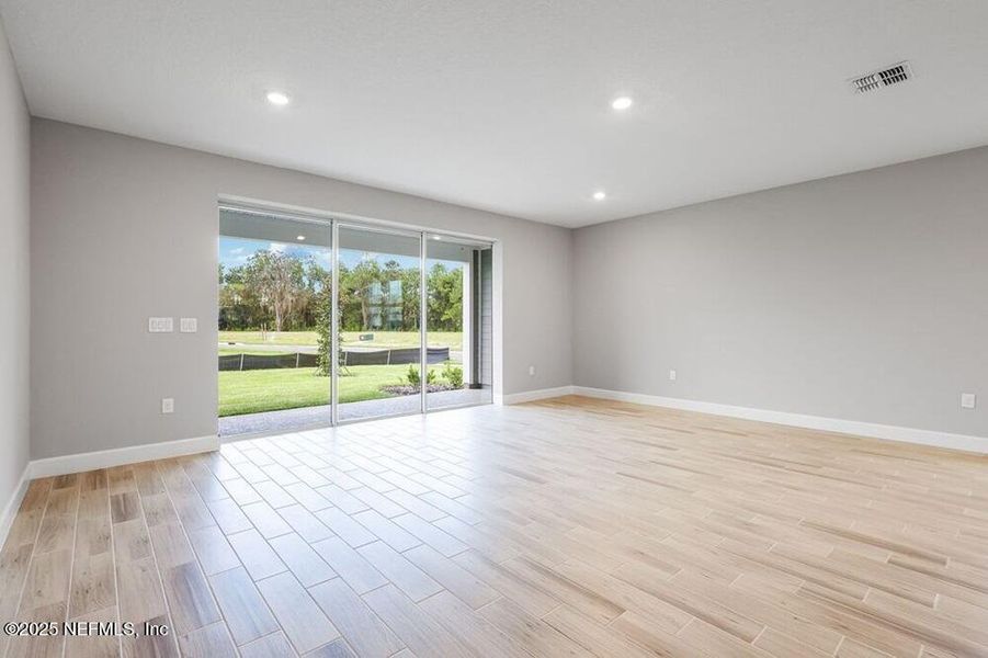 Spacious, unfurnished interior of a new home in Colbert Landings, Palm Coast (Image 33).