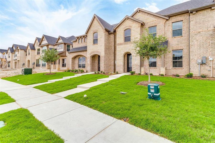 View of front of home with a front lawn