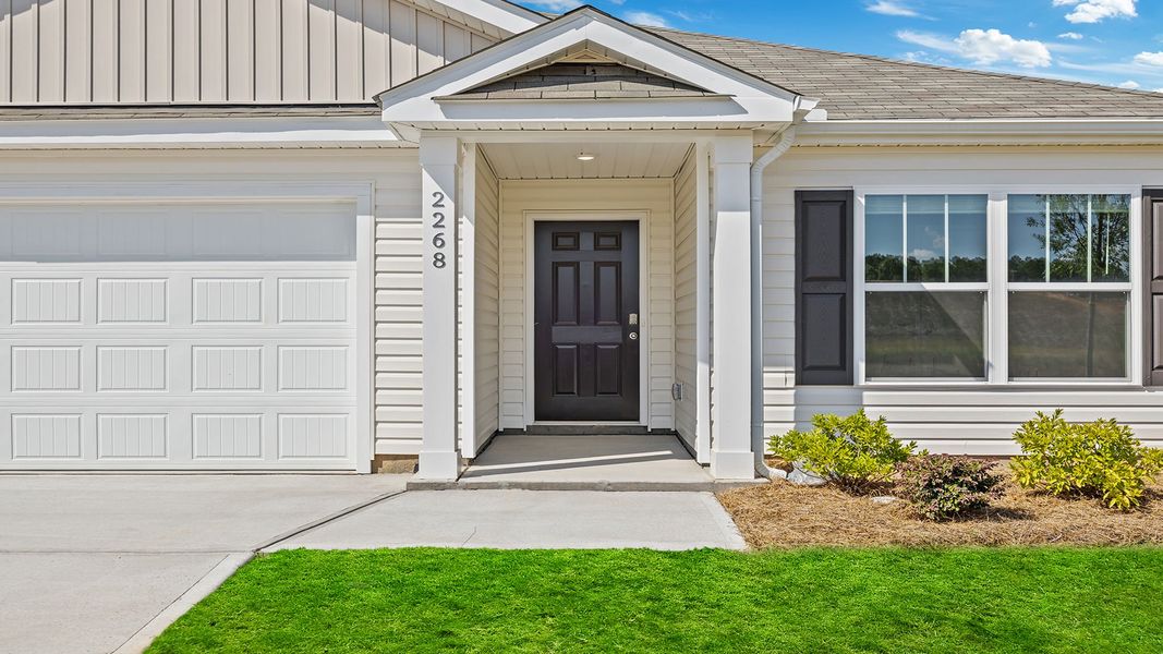 Exterior details and patio area of a home in Lightwood Cottages, Moore (Image 3).