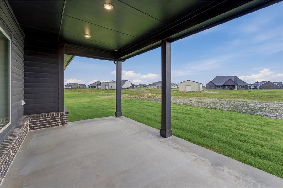 Covered concrete patio featuring recessed lighting Covered concrete patio featuring recessed lighting