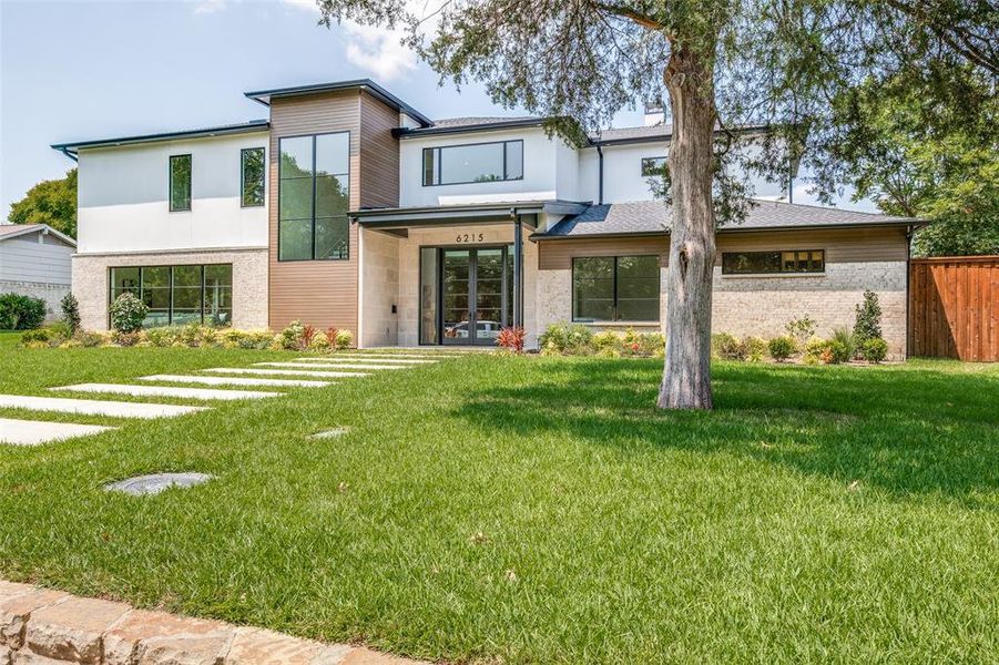 Front exterior of a new home in , Dallas, TX, highlighting curb appeal (Image 24).