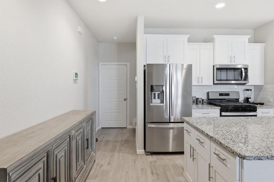 Furnished interior view inside a new home in , Fort Worth (Image 6). Furnished interior view inside a new home in , Fort Worth (Image 6).