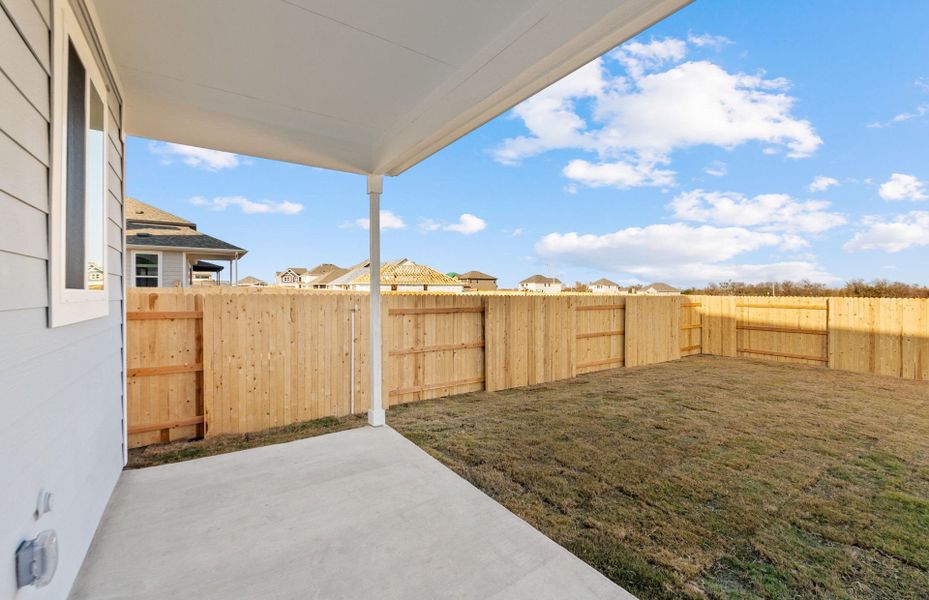 Exterior details and patio area of a home in Patterson Ranch, Georgetown (Image 27).
