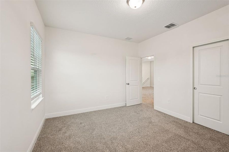 Spacious, unfurnished interior of a new home in Cyrene at Minneola, Minneola (Image 10).