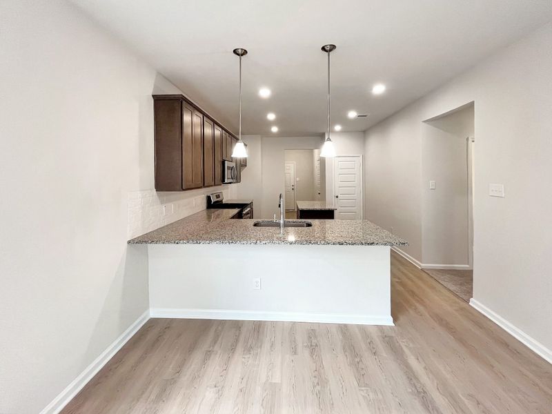 The Cardinal II- Breakfast Area into Kitchen