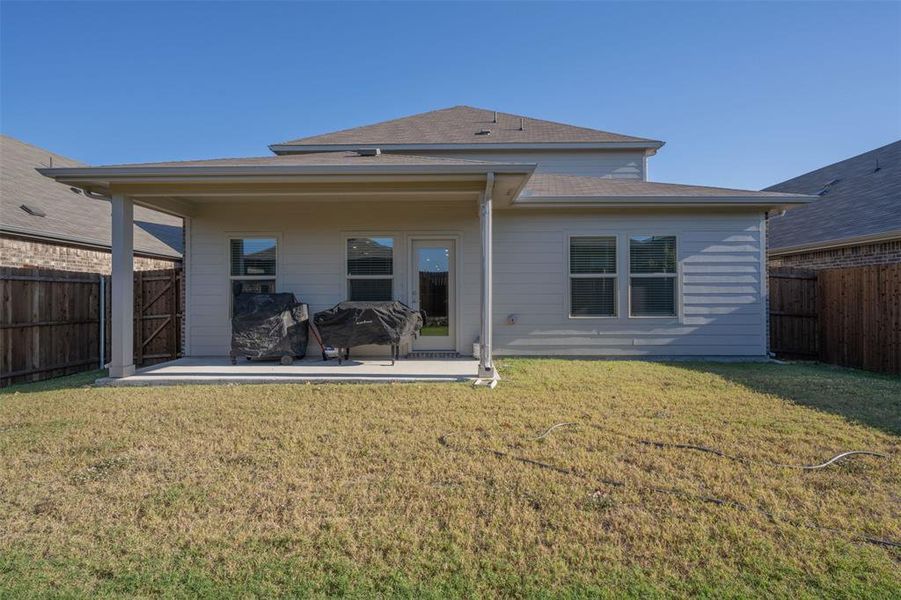 Exterior details and patio area of a home in Briarwood Hills - Highland Series, Forney (Image 23). Exterior details and patio area of a home in Briarwood Hills - Highland Series, Forney (Image 23).